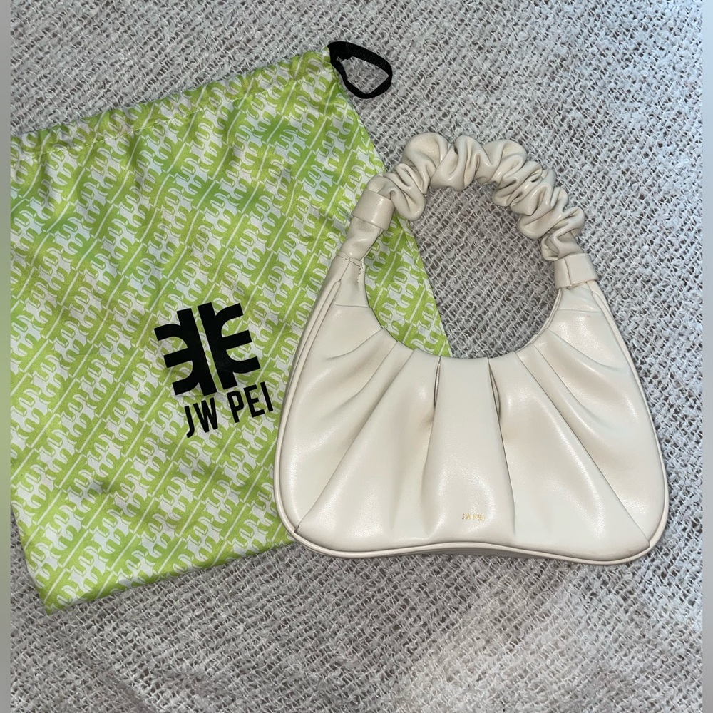 JW PEI Gabbi bag in ivory. Mint condition. Comes with duster bag.